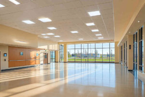 A_commercial_building_lobby_with_a_mix_of_natural_light and led lighting