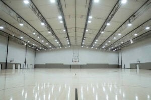 A_modern_indoor_basketball_court_illuminated_with_high bay LED light