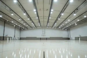 A_modern_indoor_basketball_court_illuminated_with_high bay LED light